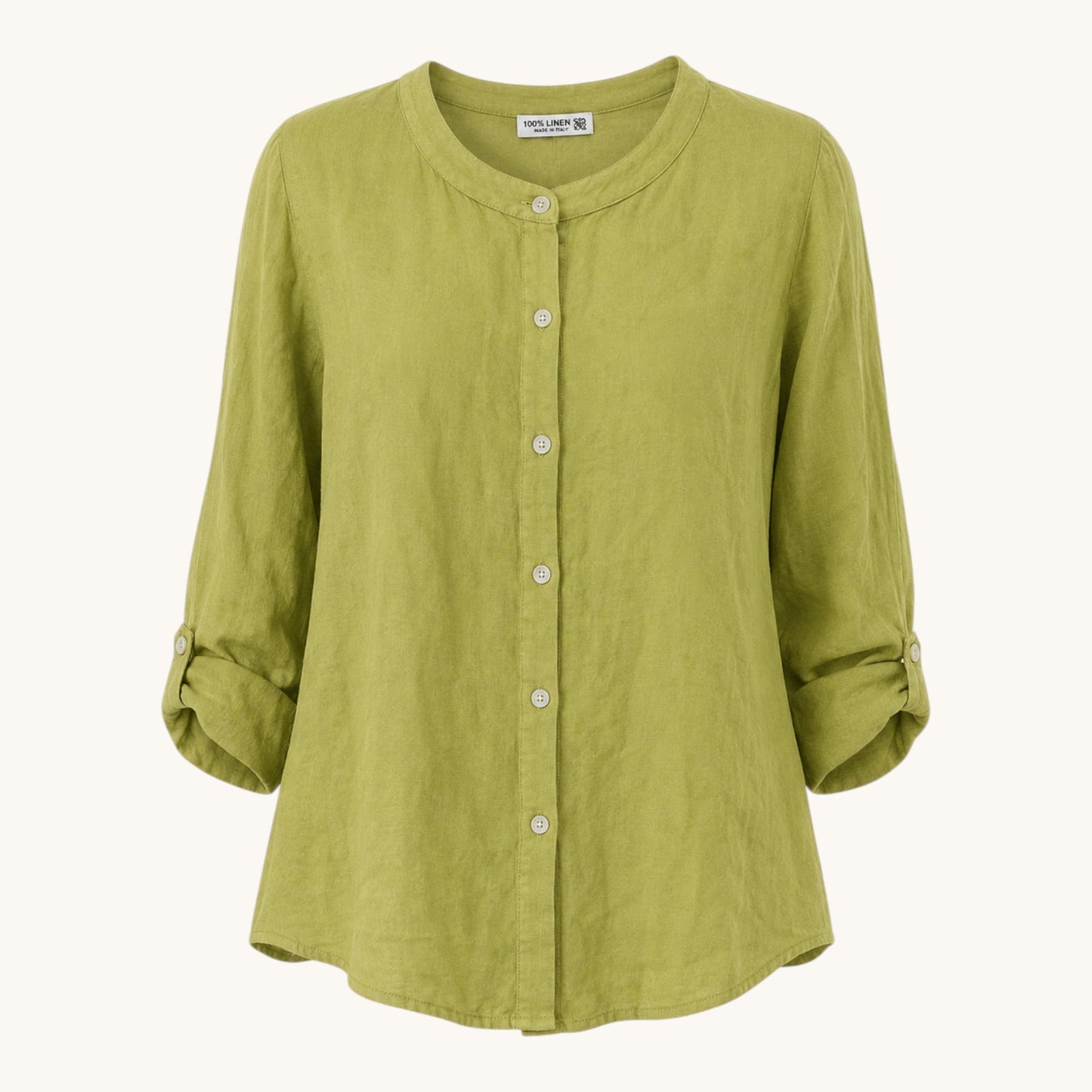 Feather & Sole green linen collarless shirt with long sleeves and a relaxed fit.