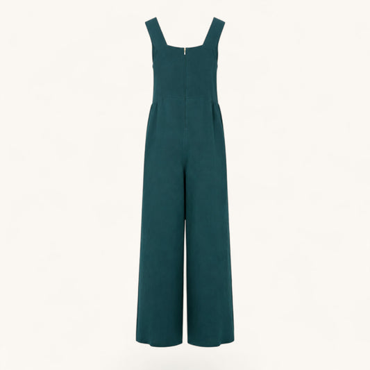 Feather & Sole teal linen jumpsuit featuring a square neckline, wide legs, and a back zipper closure.