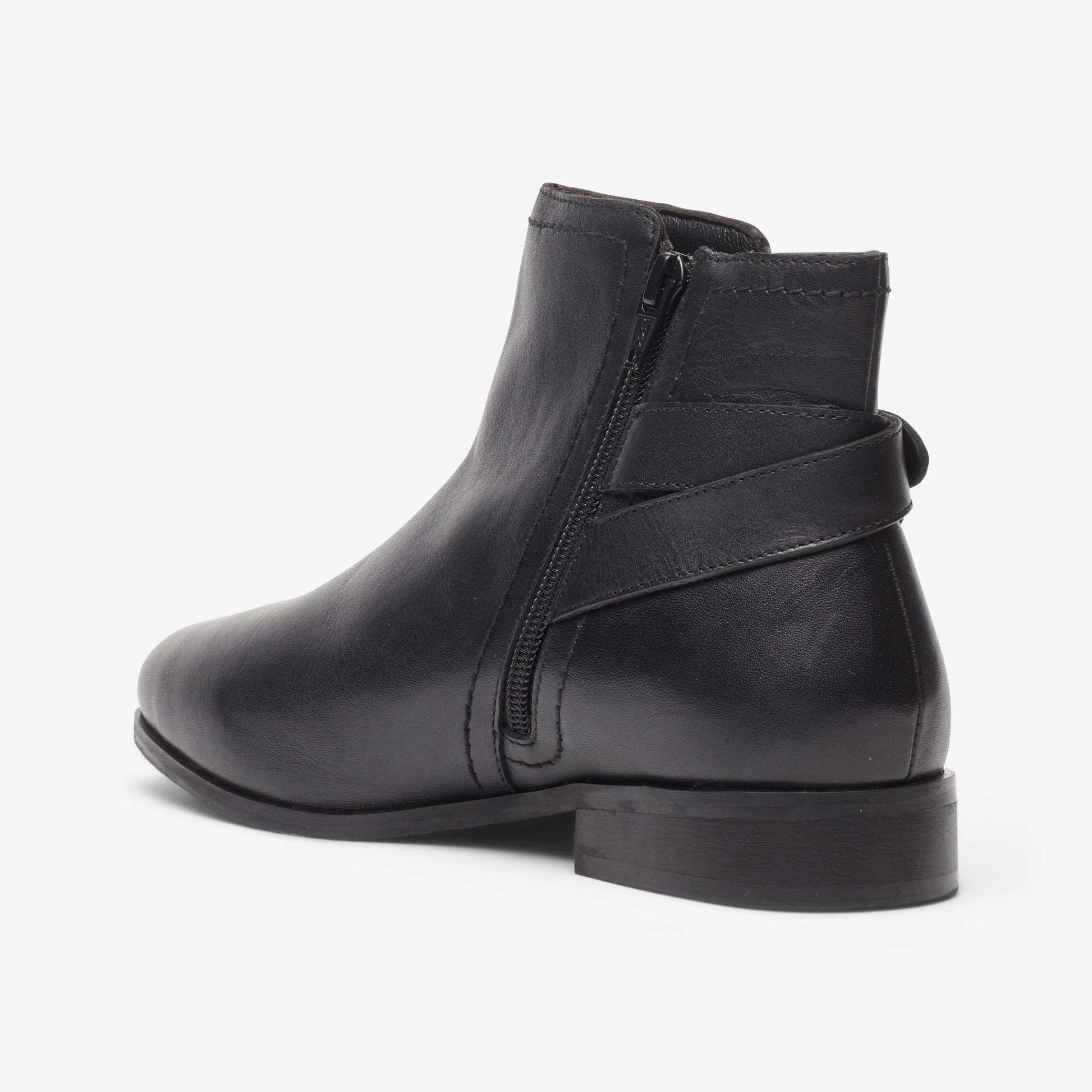 Rear view of wide fit leather ankle boot with strap and buckle detail