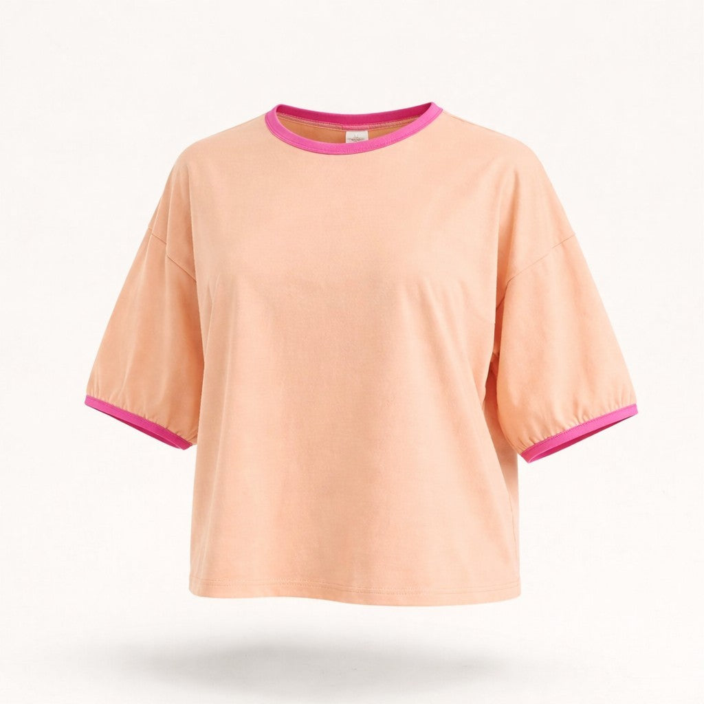Feather & Sole peach cotton t-shirt with pink trim on neckline and puffed short sleeves.