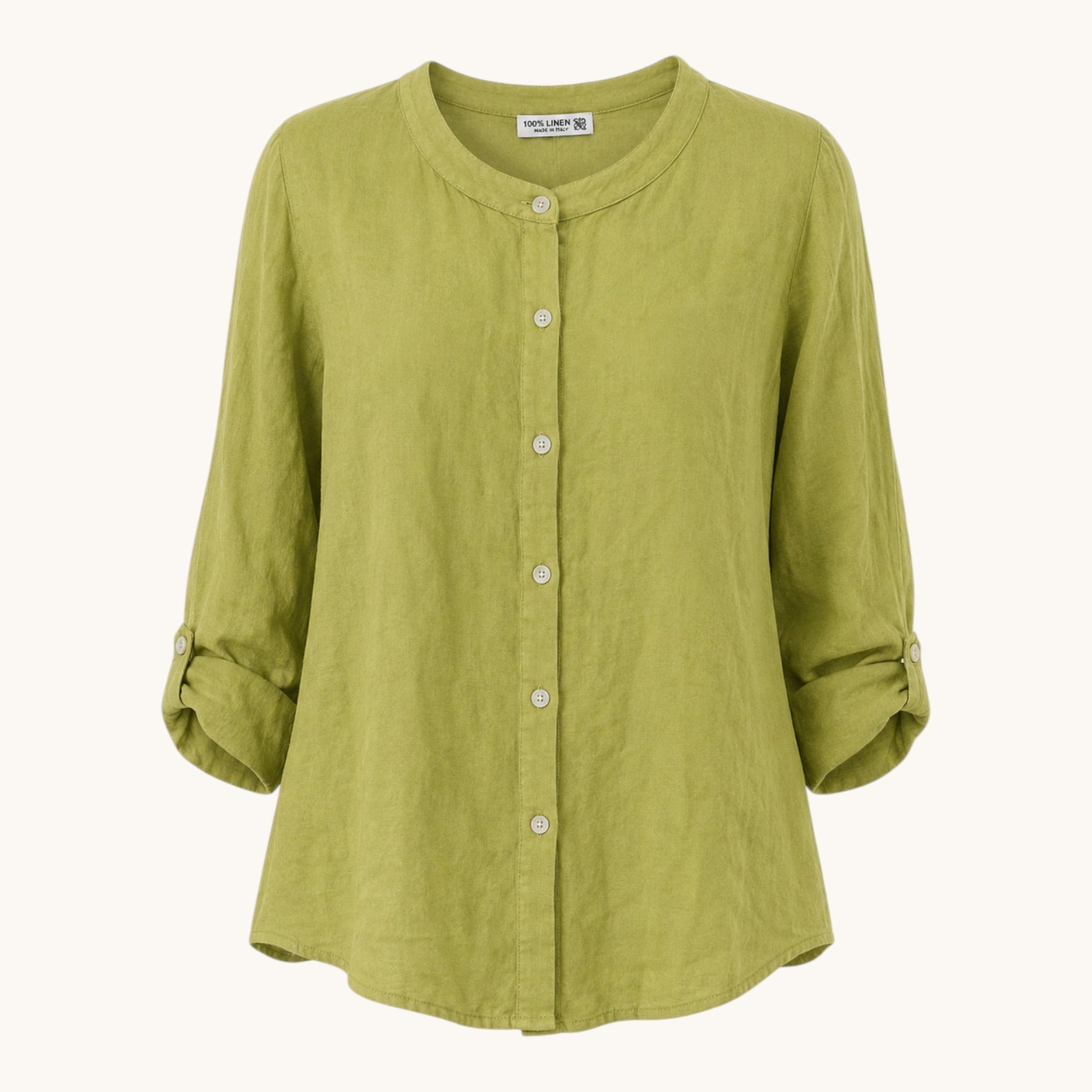 Feather & Sole green linen collarless shirt with long sleeves and a relaxed fit.