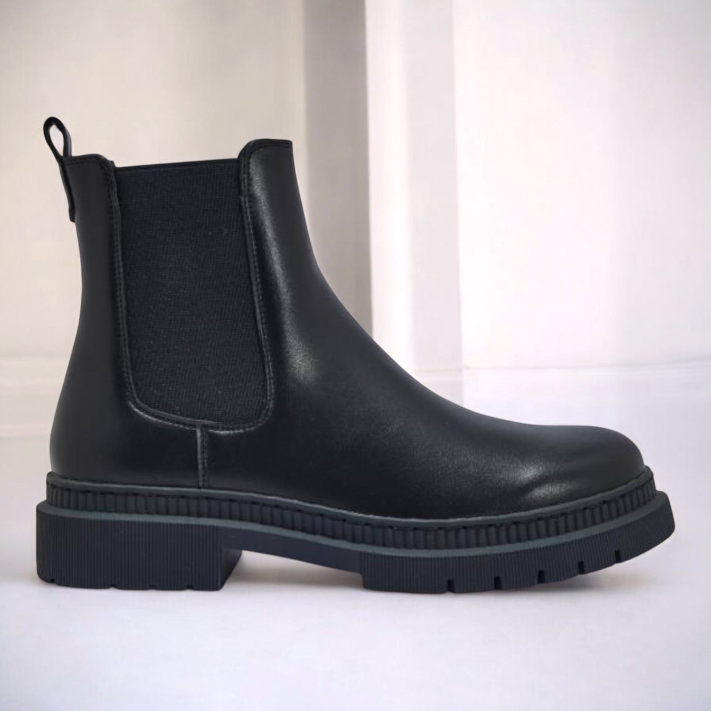 Black Cleat Sole Ankle Boot