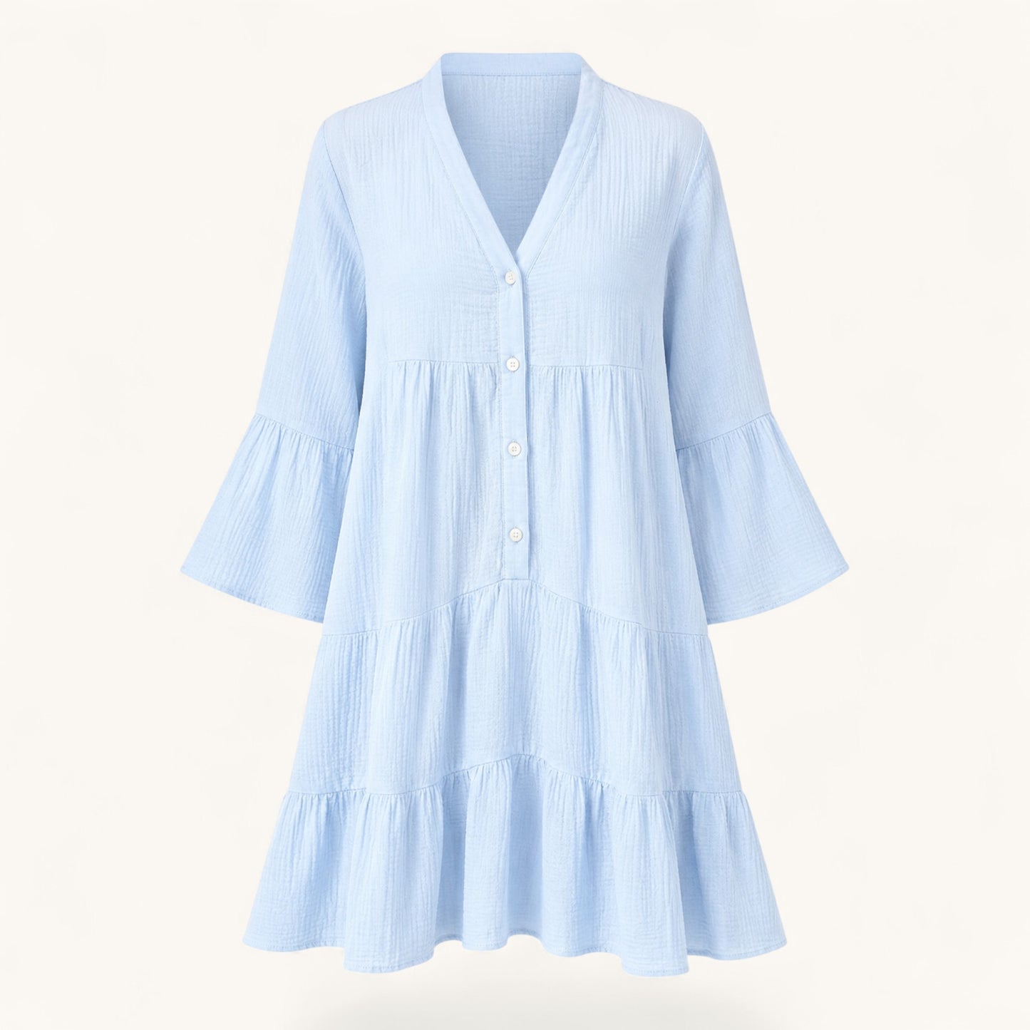 Feather & Sole light blue tiered short dress in 100% cotton gauze with a V-neck and button-front closure.