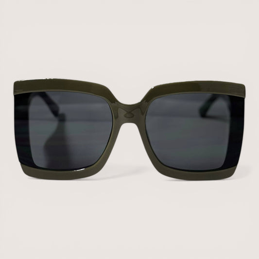 Feather & Sole oversized square sunglasses in dark green with dark tinted lenses. Chunky, modern design for stylish sun protection.