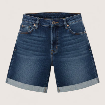 Feather & Sole dark blue stretch denim shorts with cuffed hems and high waist. Model is 169cm tall.