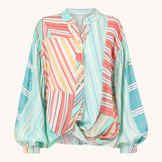Feather & Sole coral, spearmint, yellow and white patchwork stripe button-down shirt with balloon sleeves and a twisted front detail. Made in Italy from 70% Viscose and 30% Tencel.
