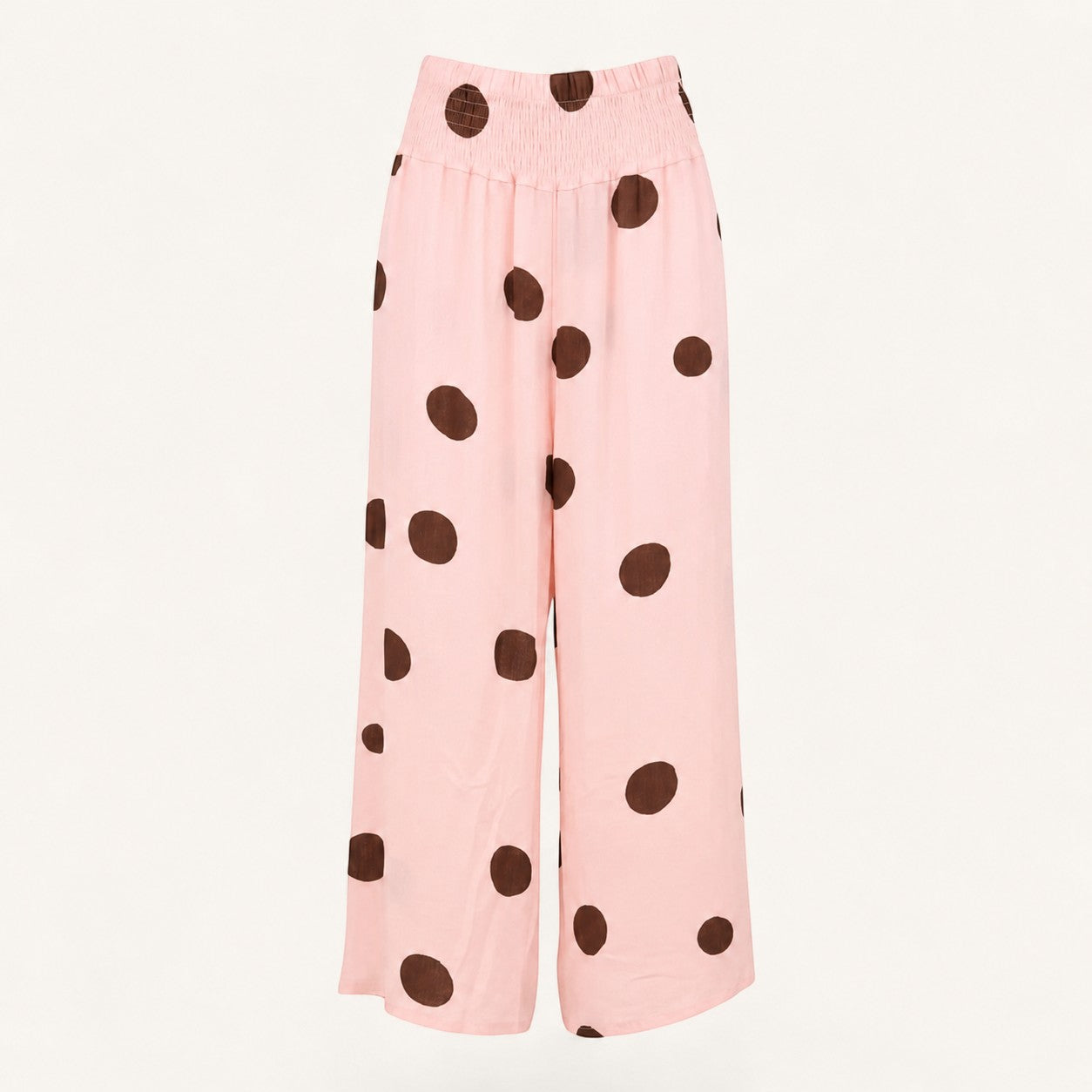 Feather & Sole pink linen trousers with brown polka dots and elasticated waistband.