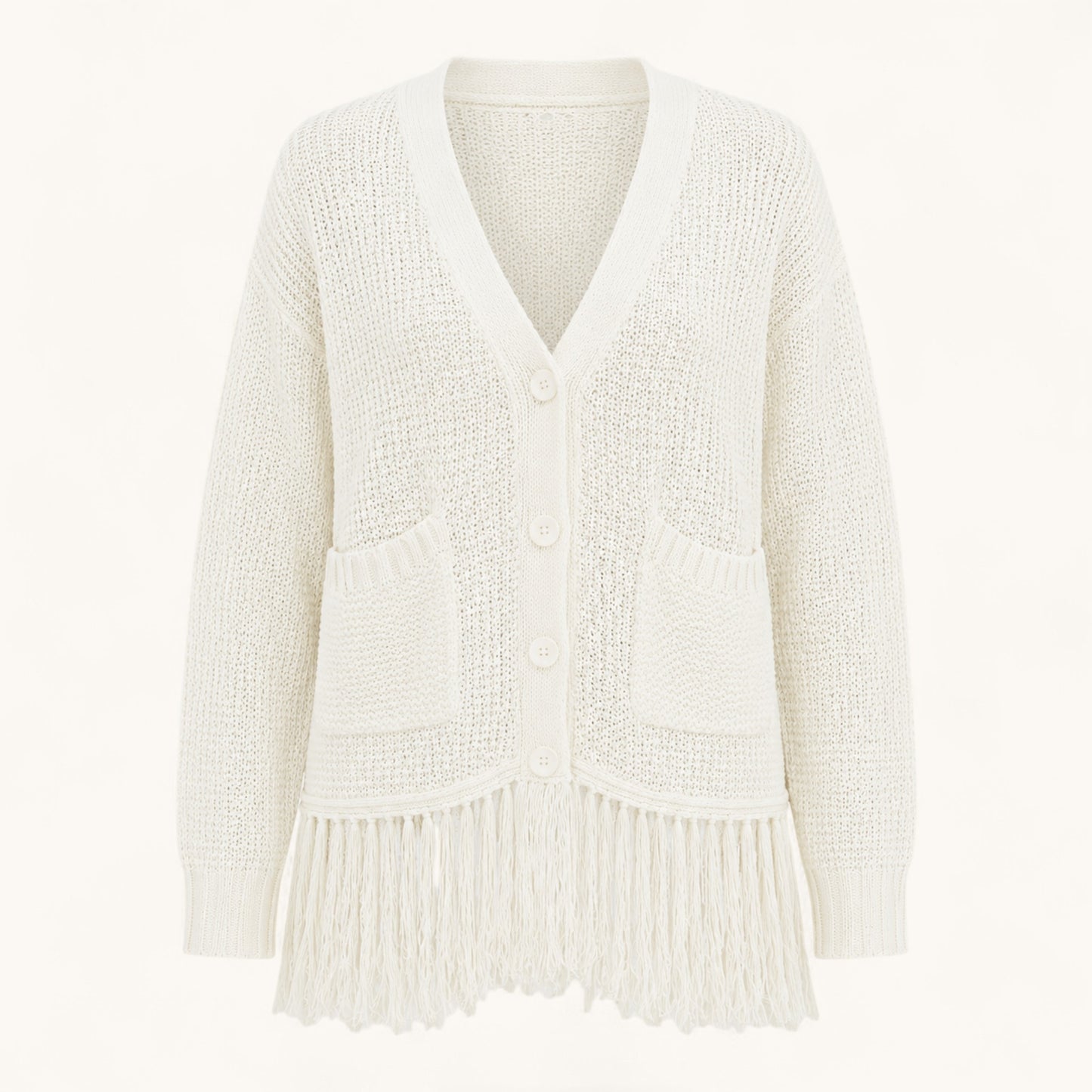 Feather & Sole white crochet knit cardigan with fringe hem, V-neck, button front, and two front pockets.